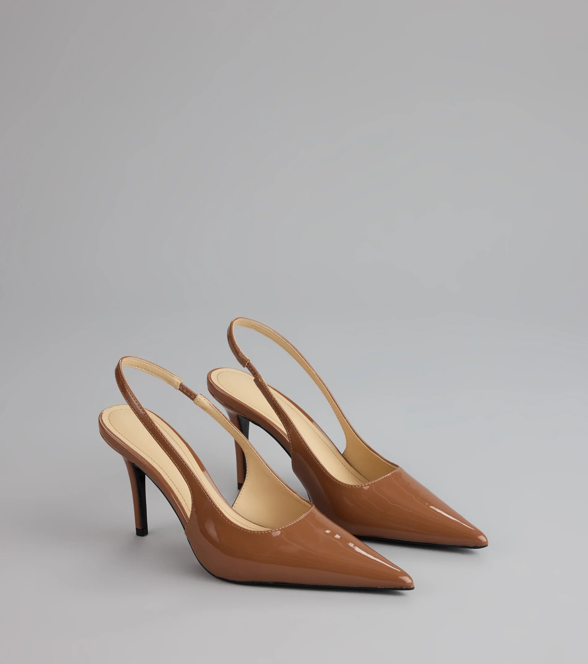 Sharp Finish Patent Slingback Pumps